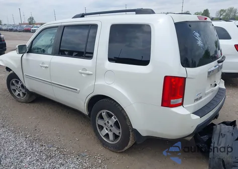 2011 Honda Pilot Touring из США, поврежденный, VIN 5FNYF4H96BB106873